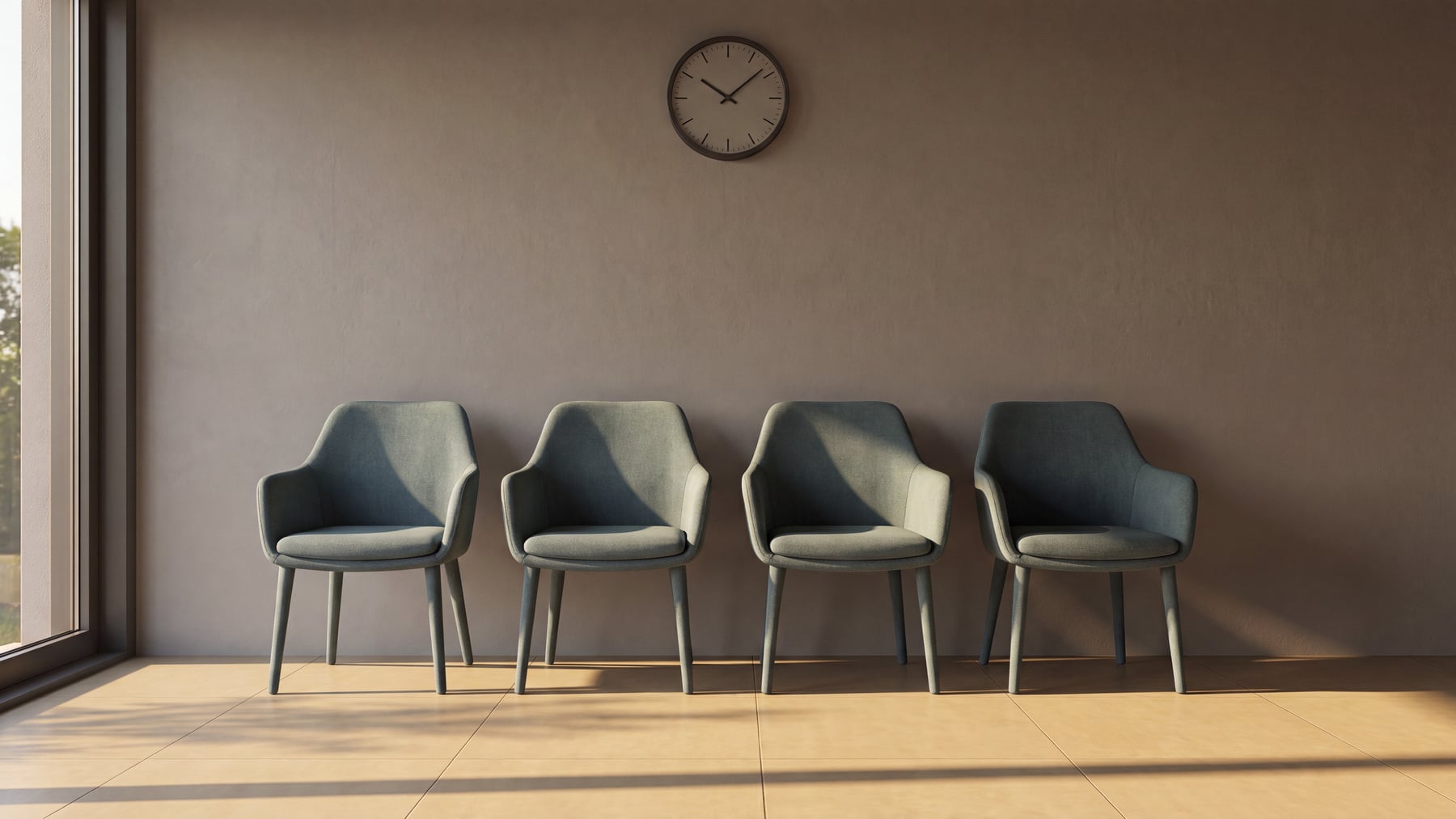 Four empty grey-green waiting-room chairs against a bare wall under a clock, warm daylight across a tiled floor, illustrating mental health access latency.